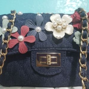 A blue jean purse